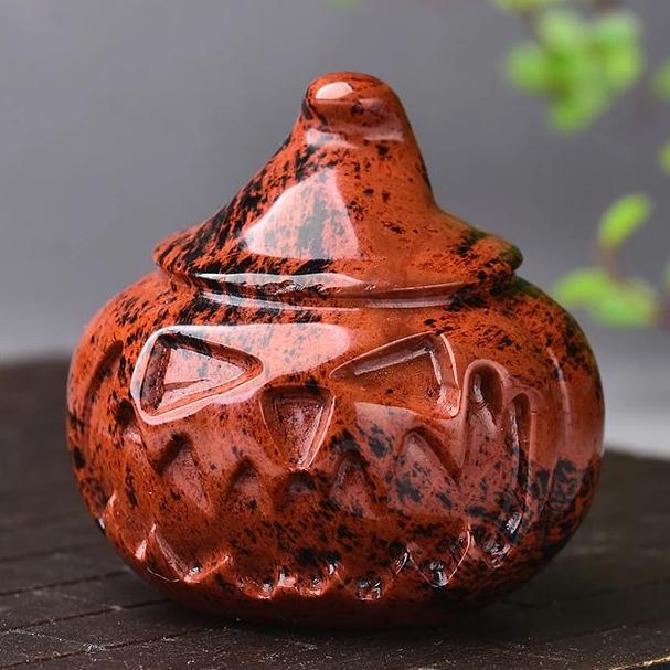 Carved Red Obsidian Witch Pumpkin Figurine